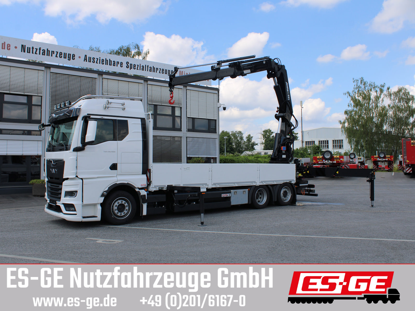 MAN TGX 26.480 6x2-4 LL CH mit MKG-Ladekran HLK531 a5